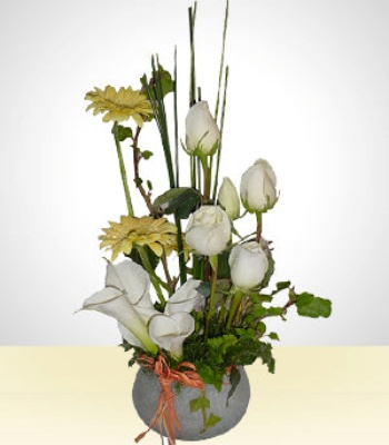 Mixed Flowers In Glass Vase