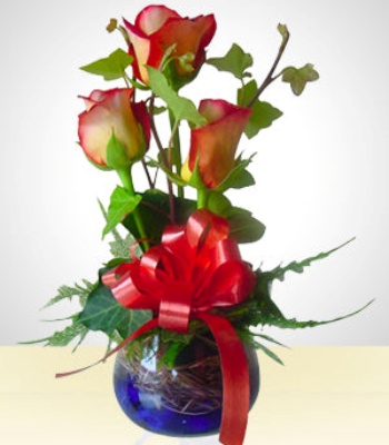 Rose Flowers In Glass Vase