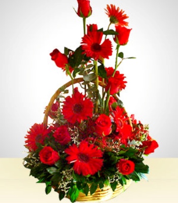 Roses And Gerberas In Wicker Basket