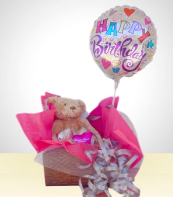 Teddy Bear And Chocolates In Basket