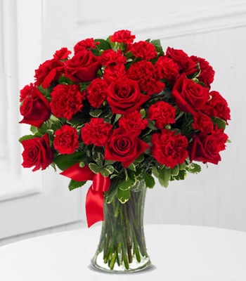 Roses and Red Carnation Arrangement