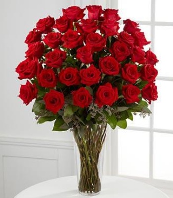 Roses and Eucalyptus in Vase