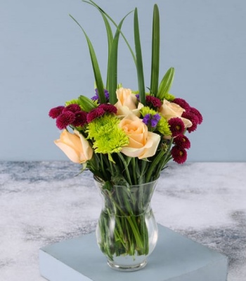 Berry Peach Flowers in Hurricane Vase