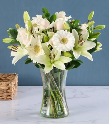 Cream And White Flowers In Vase