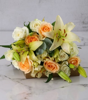 Cream Lilies And White Roses Arrangement