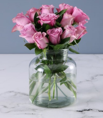 Lilac Roses in Glass Vase