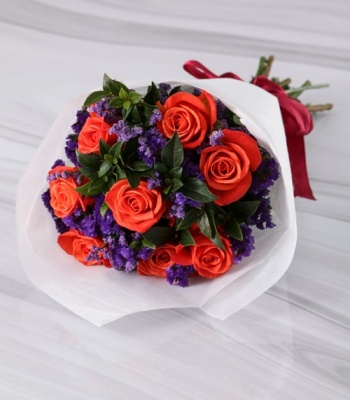 Orange Roses In White Wrapping