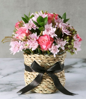 Pink Flowers in Beach Basket