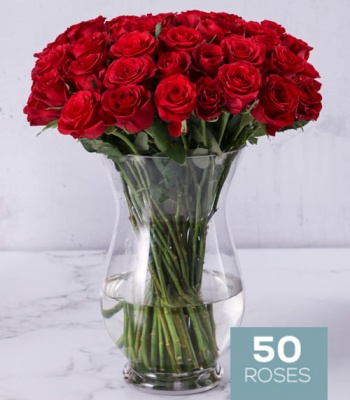 Red Roses In Hurricane Vase