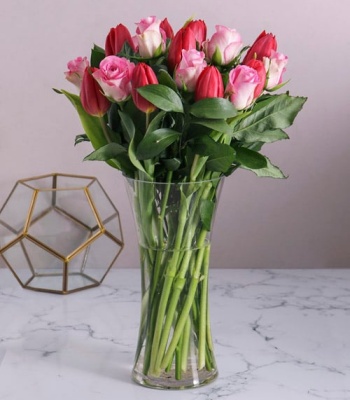 Red Tulips And Pink Roses In Vase