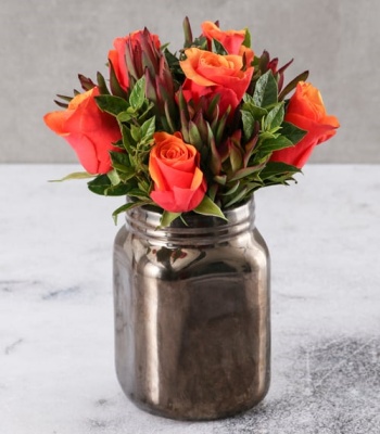 Roses In Bronze Vase