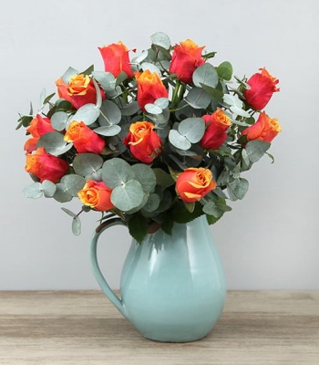 Roses In Ceramic Jug