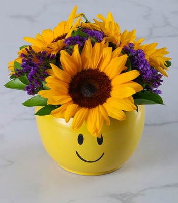 Sunflowers In Smiley Pot