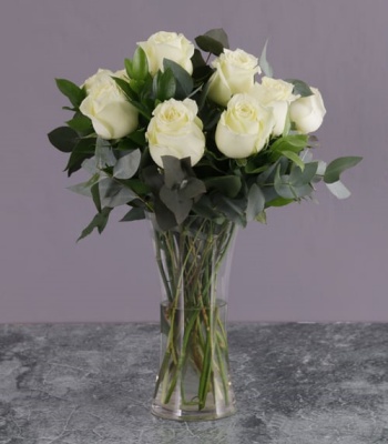 White Roses In Glass Vase