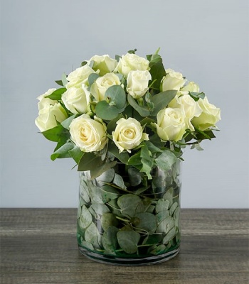 White Roses In Round Vase