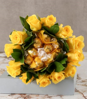 Yellow Roses And Chocolate Arrangement