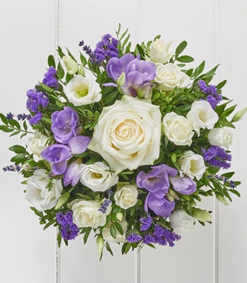 Purple and White Flowers Arranged in Hatbox
