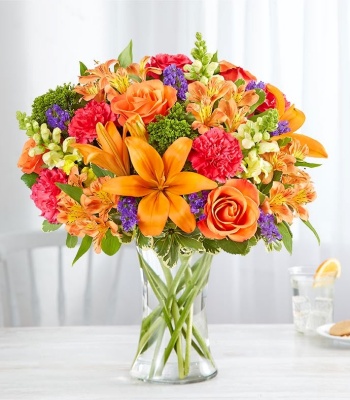 Mix Flowers in Clear Glass Vase